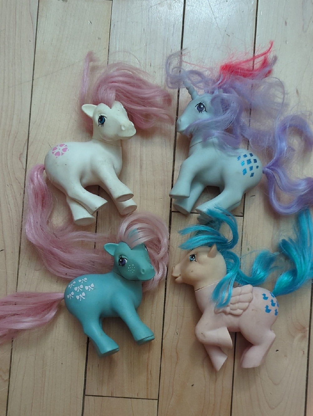 Vintage My Little Pony Four-Pony Set in Pink, Purple, Teal, Blue